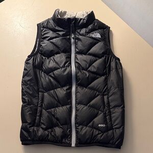 The North Face Black Puffer Vest with side slit pockets /grey reversible